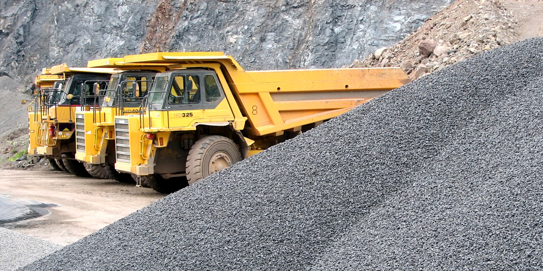 Yellow Dump Trucks for Heavy Duty Use on Construction Site