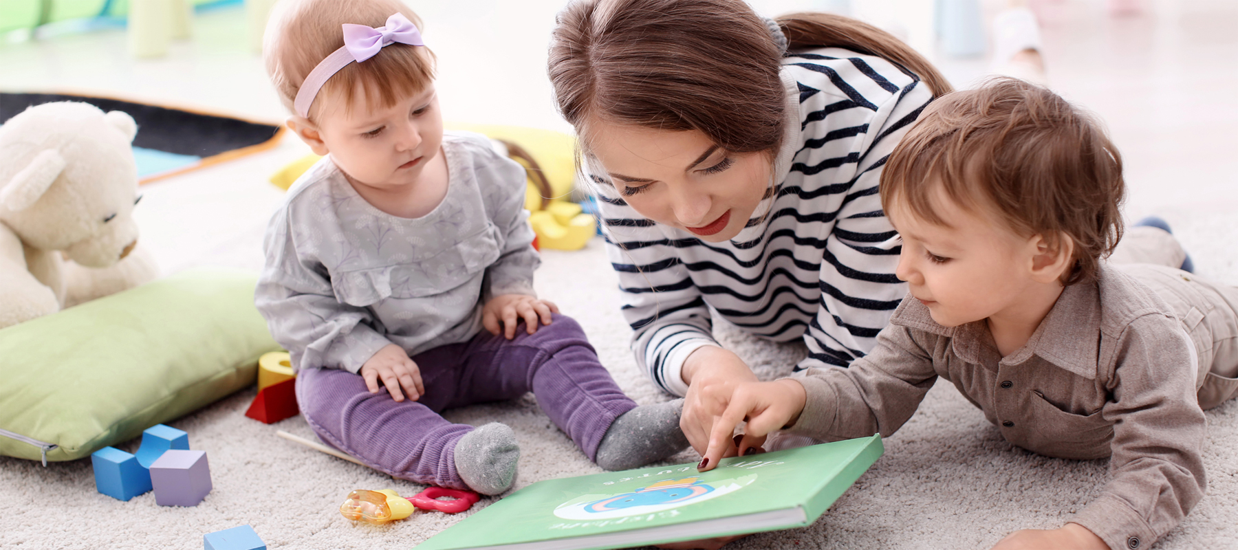 A Nanny with Two Children Teaching