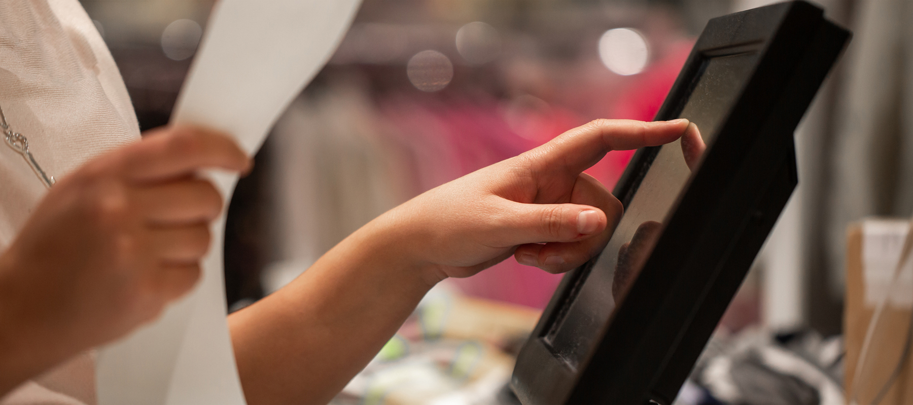 Waitress Entering an Order into a POS Touch Screen