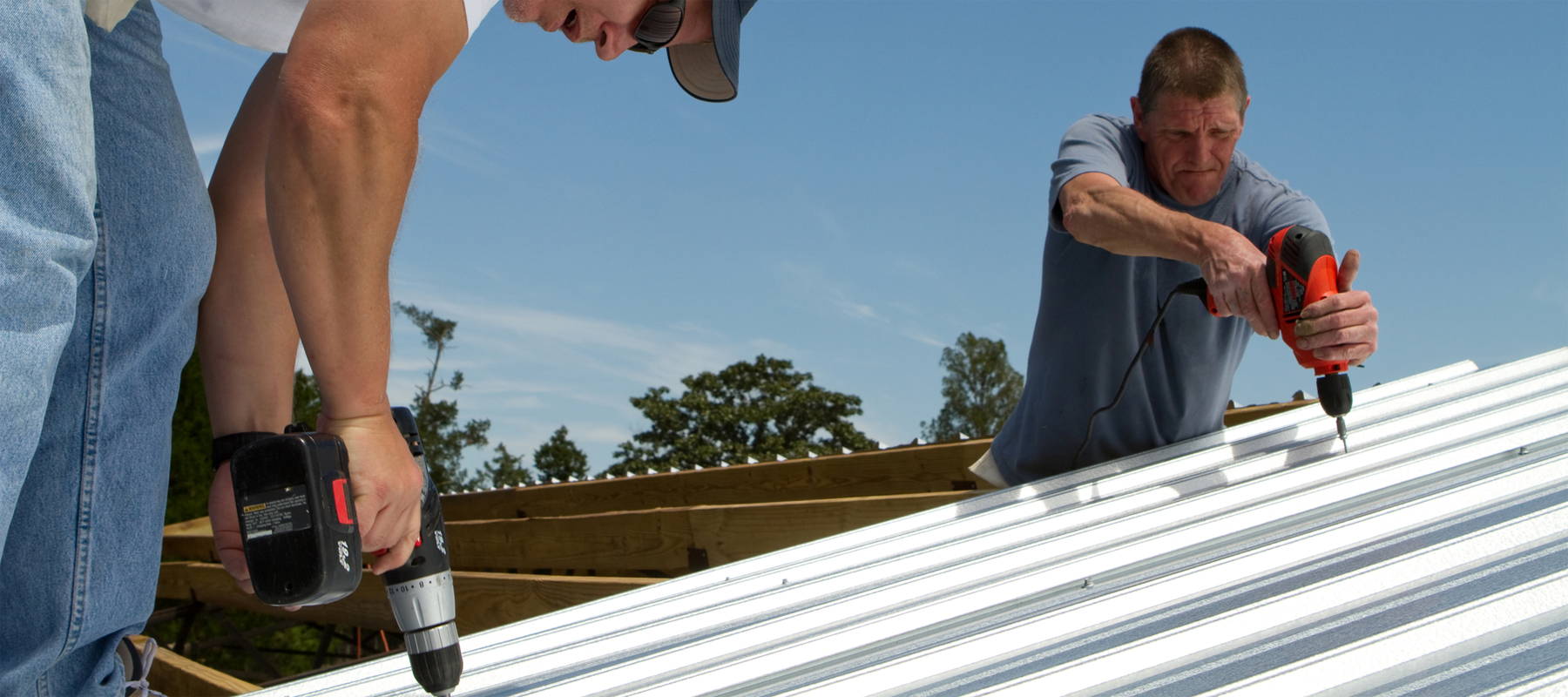 Construction Workers Installing a Galvalume Metal Roof